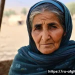 Home 20 아프가니스탄 난민 현황 - **"Echoes of Home and Resilience"**: An older Afghan woman, her face etched with a lifetime of stori...